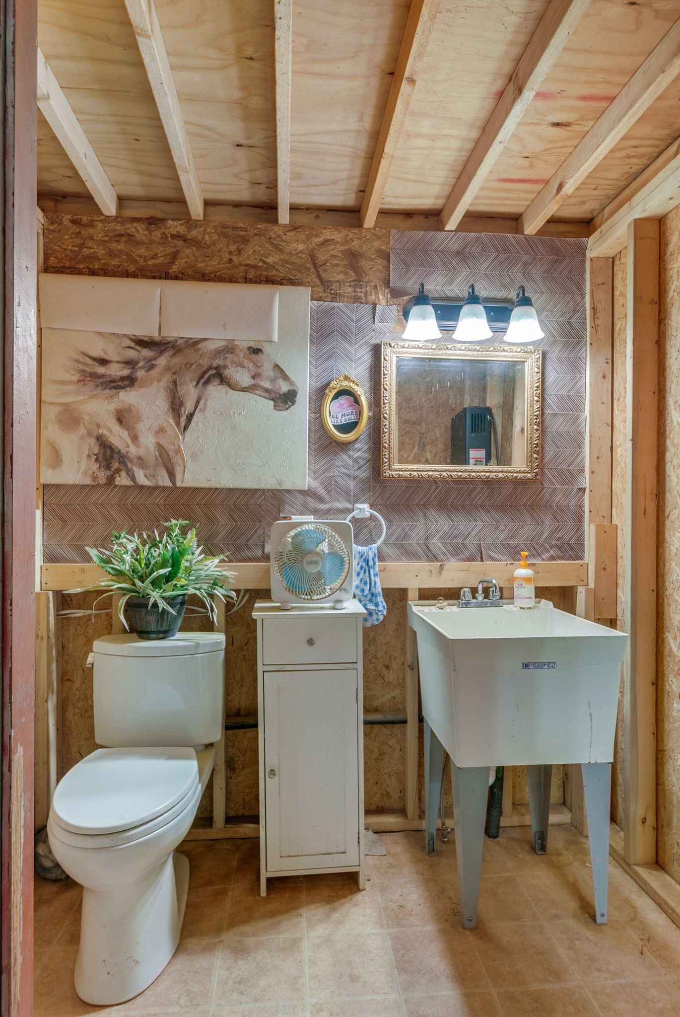 54 Shelton Road Fayetteville, TN 37334 - Photo 13 of 65 a bathroom with a granite countertop toilet sink and mirror