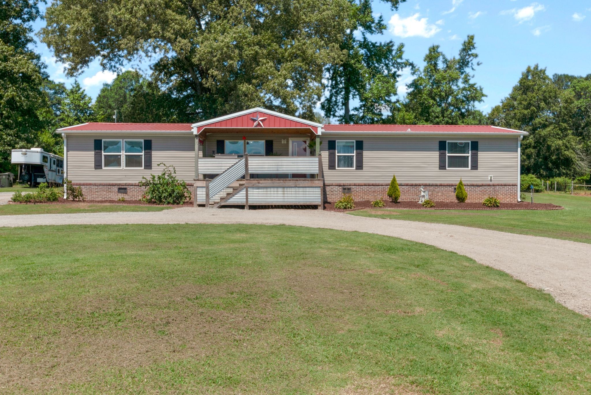 54 Shelton Road Fayetteville, TN 37334 - Photo 14 of 65 a front view of a house with garden