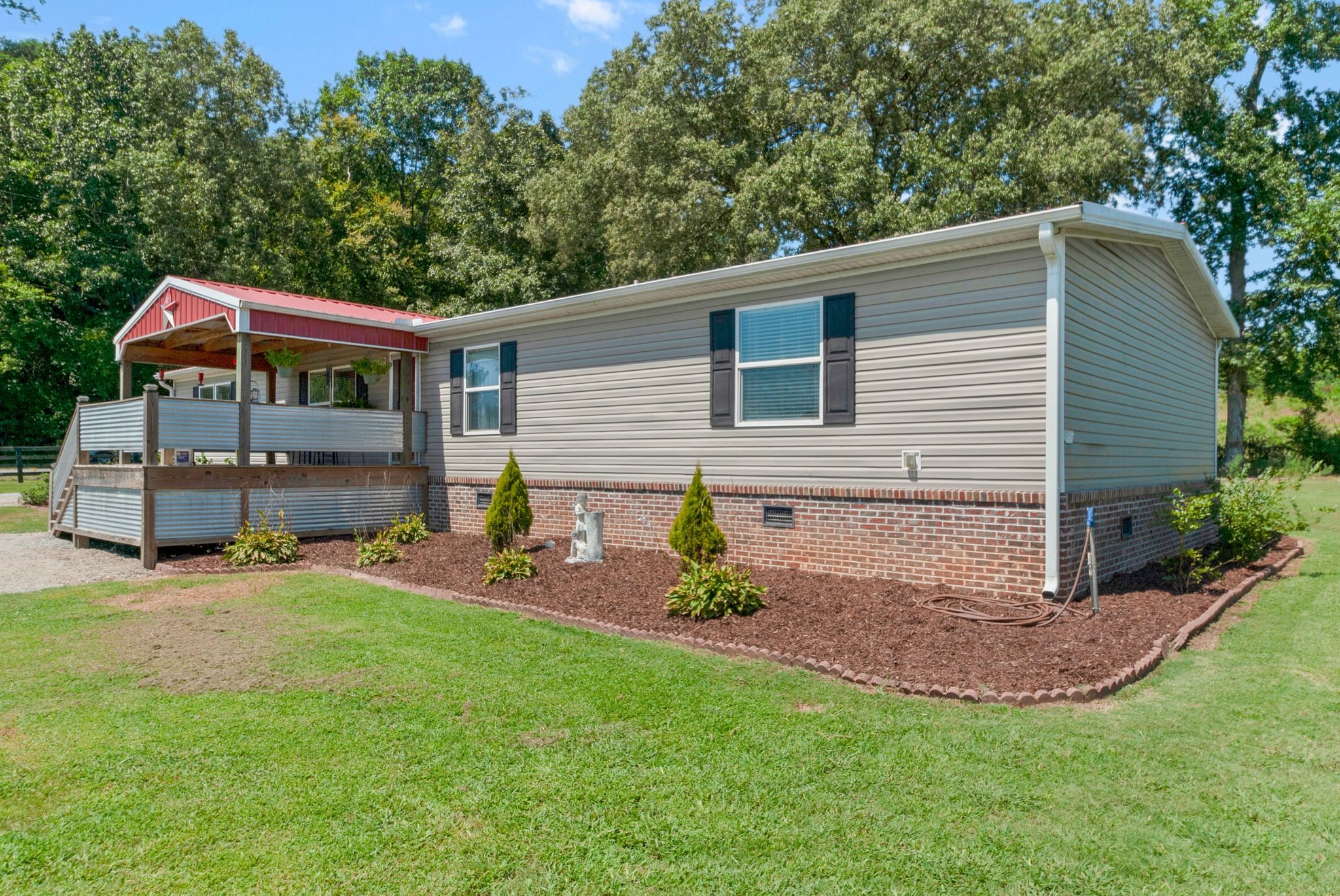 54 Shelton Road Fayetteville, TN 37334 - Photo 15 of 65 a backyard of a house with table and chairs