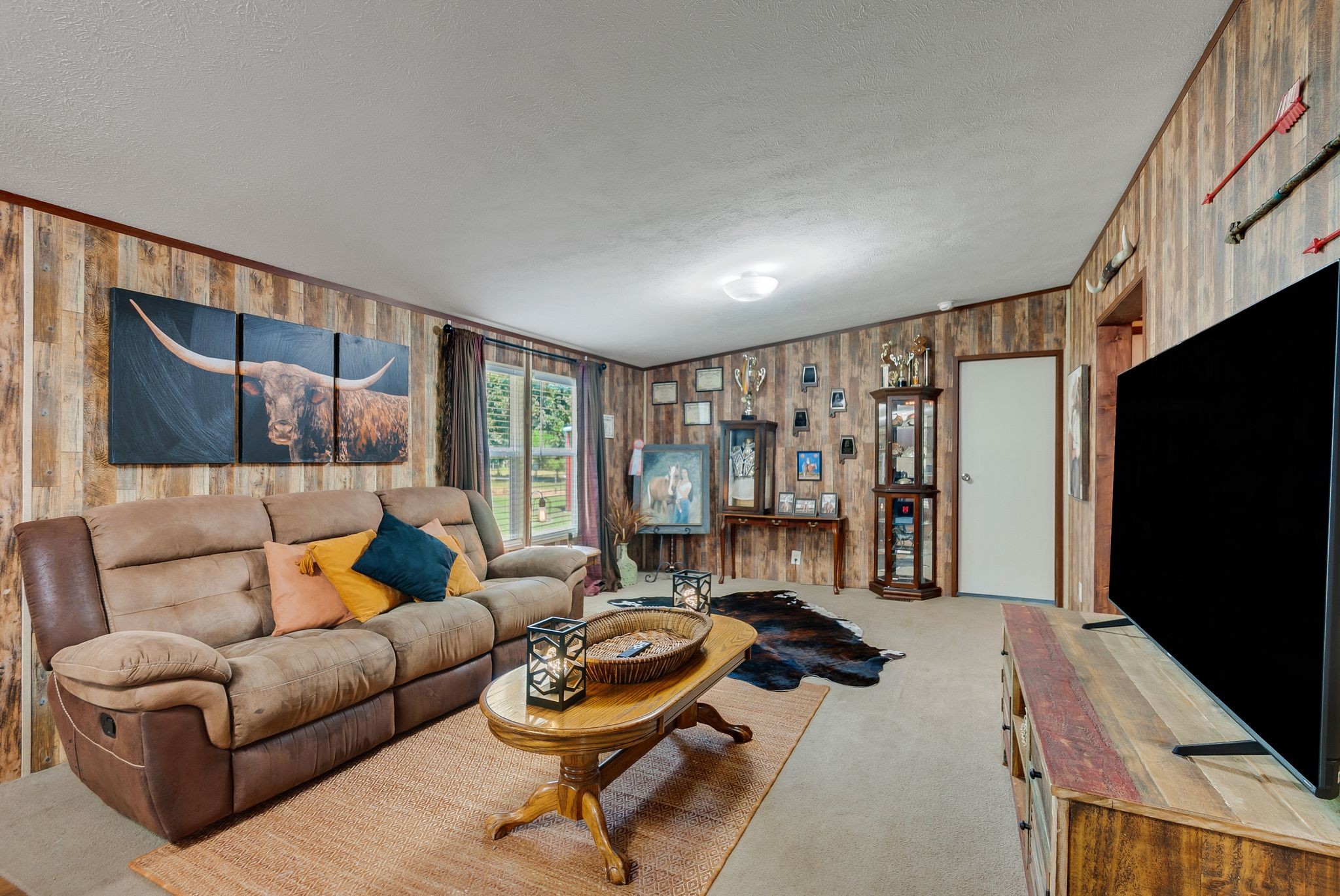 54 Shelton Road Fayetteville, TN 37334 - Photo 31 of 65 a living room with furniture and a flat screen tv