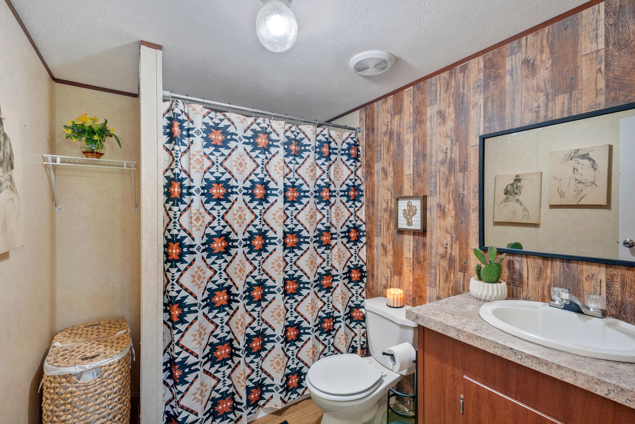 54 Shelton Road Fayetteville, TN 37334 - Photo 38 of 65 a bathroom with a granite countertop toilet sink and mirror