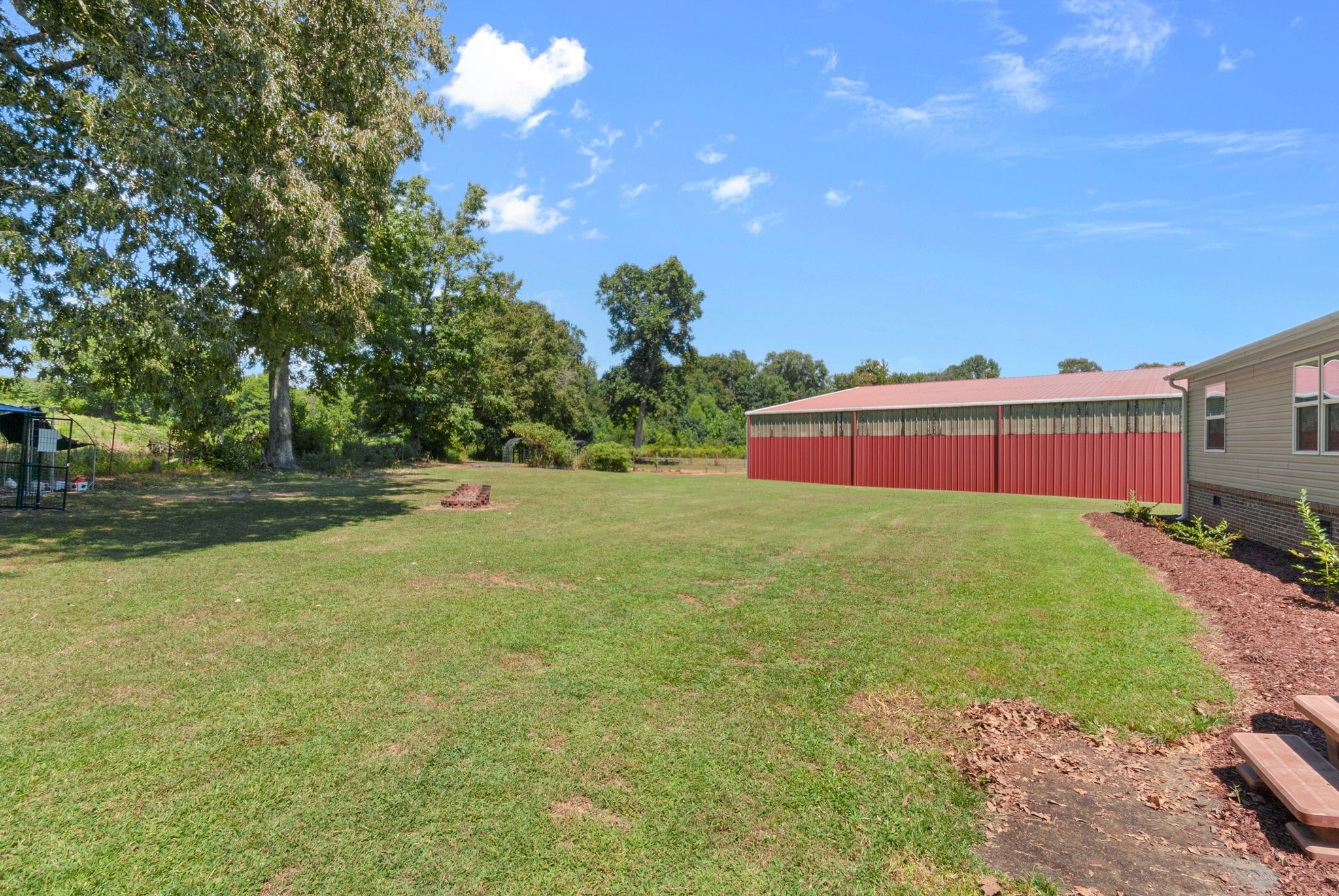 54 Shelton Road Fayetteville, TN 37334 - Photo 45 of 65 a front view of a house with garden