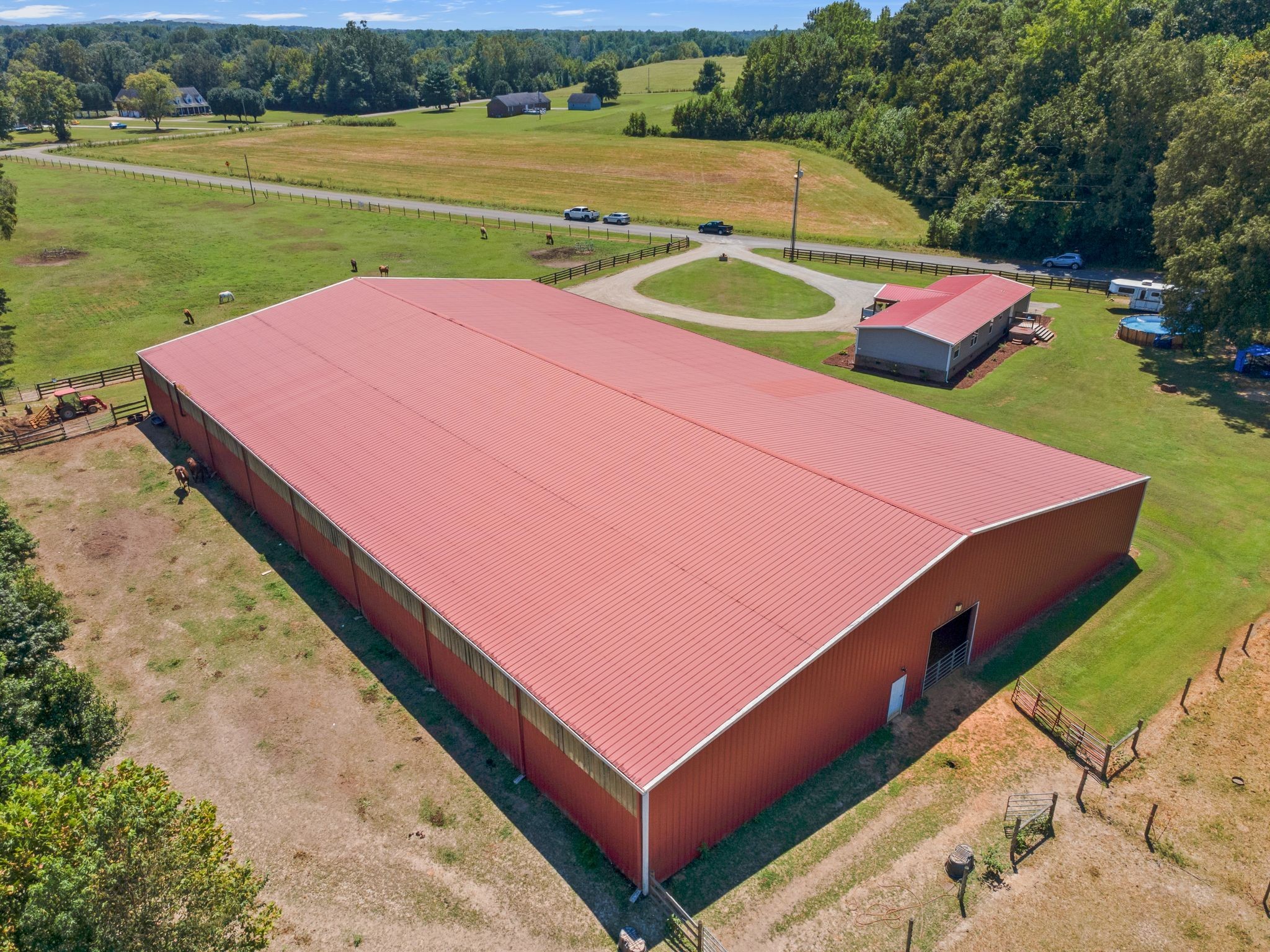 54 Shelton Road Fayetteville, TN 37334 - Photo 58 of 65 an aerial view of a tennis ground and a lake view