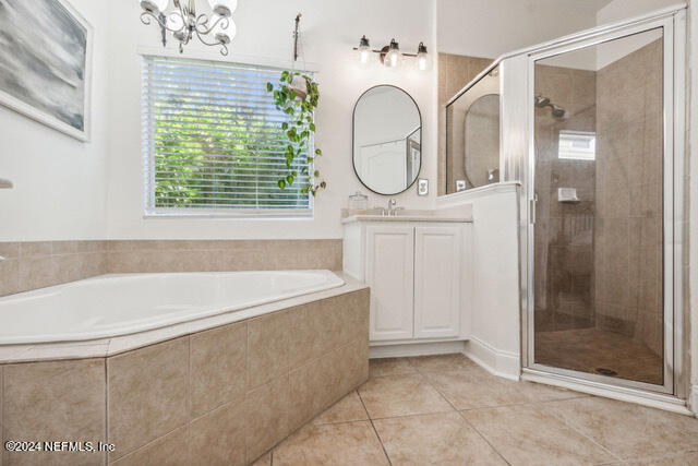 3704 Chasing Falls Road Orange Park, FL 32065 - Photo 30 of 55 has a soaking tub and separate shower