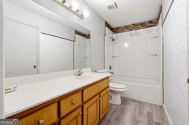 a bathroom with a sink and a toilet