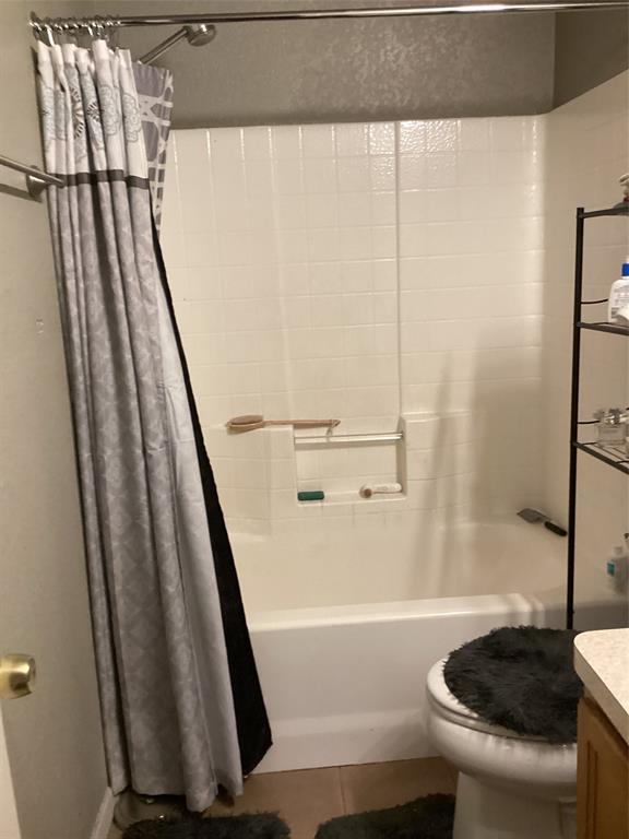 2003 Leath Street Dallas, TX 75212 - Photo 16 of 23 a bathroom with a sink a bathtub and a shower