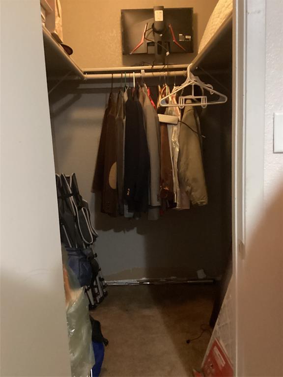 2003 Leath Street Dallas, TX 75212 - Photo 20 of 23 a view of walk in closet with clothes and shoes