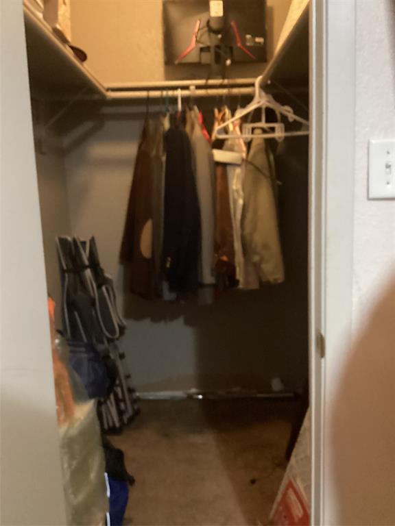 2003 Leath Street Dallas, TX 75212 - Photo 21 of 23 a view of walk in closet with clothes and shoes