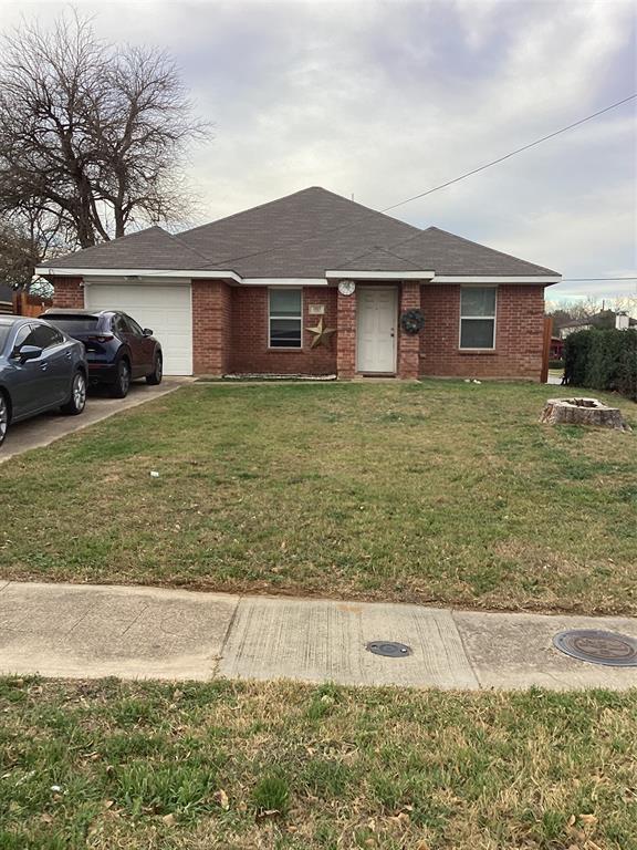 2003 Leath Street Dallas, TX 75212 - Photo 3 of 23 a front view of a house with garden