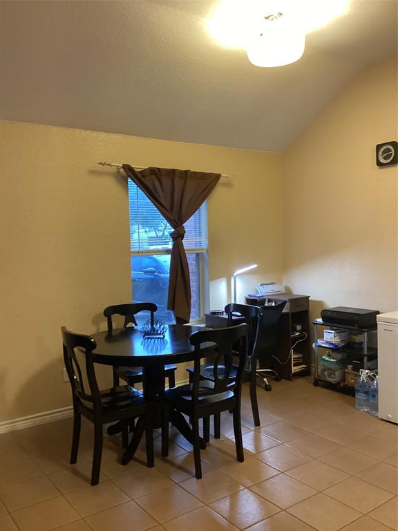 2003 Leath Street Dallas, TX 75212 - Photo 5 of 23 a view of a dining room with furniture and chandelier