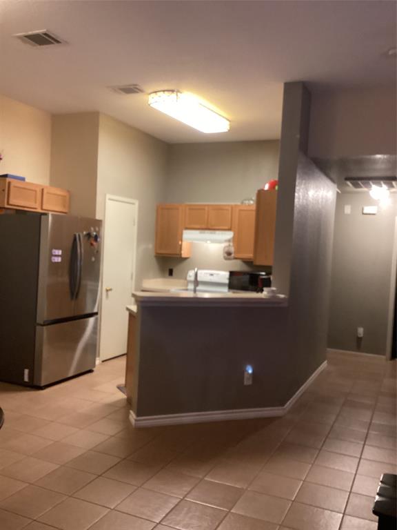 2003 Leath Street Dallas, TX 75212 - Photo 8 of 23 a kitchen with stainless steel appliances a refrigerator and a sink
