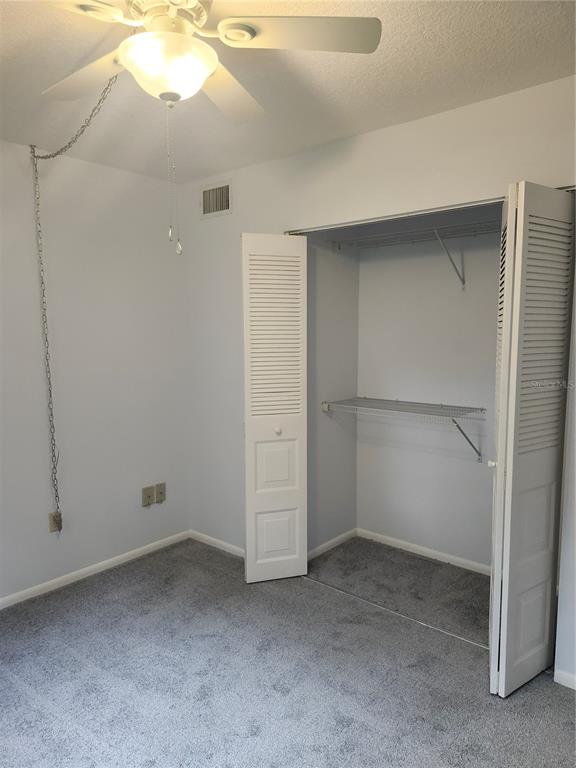 1515 Forrest Nelson Boulevard, Unit J104 Port Charlotte, FL 33952 - Photo 12 of 27 a view of an empty room