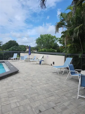 a view of outdoor space with lounge chair