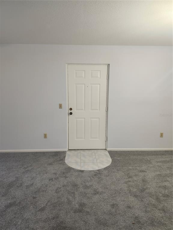 1515 Forrest Nelson Boulevard, Unit J104 Port Charlotte, FL 33952 - Photo 4 of 27 a view of wooden floor