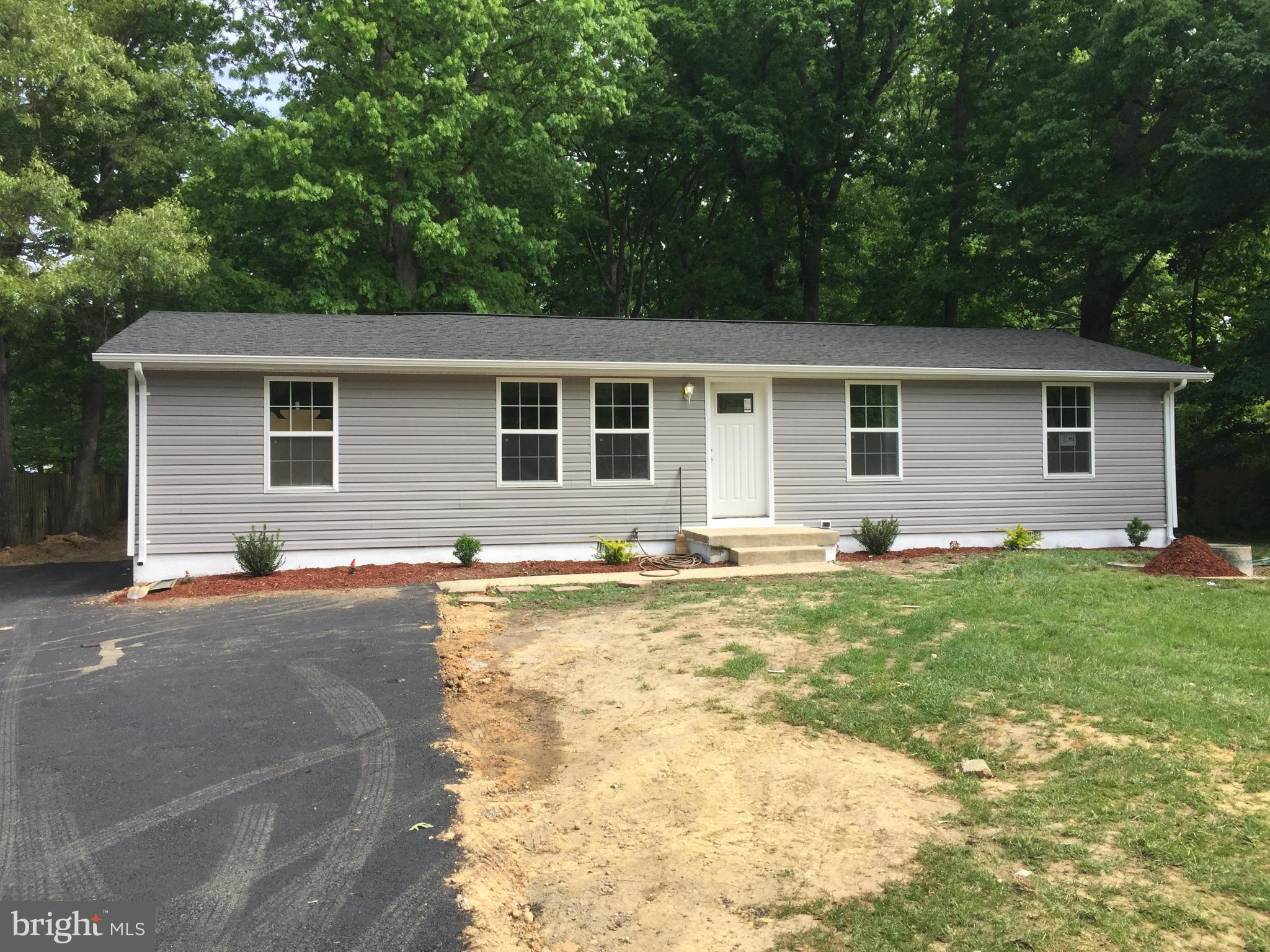 205 Biddle Road Accokeek, MD 20607 - Photo 2 of 24 a swimming pool view with a outdoor seating