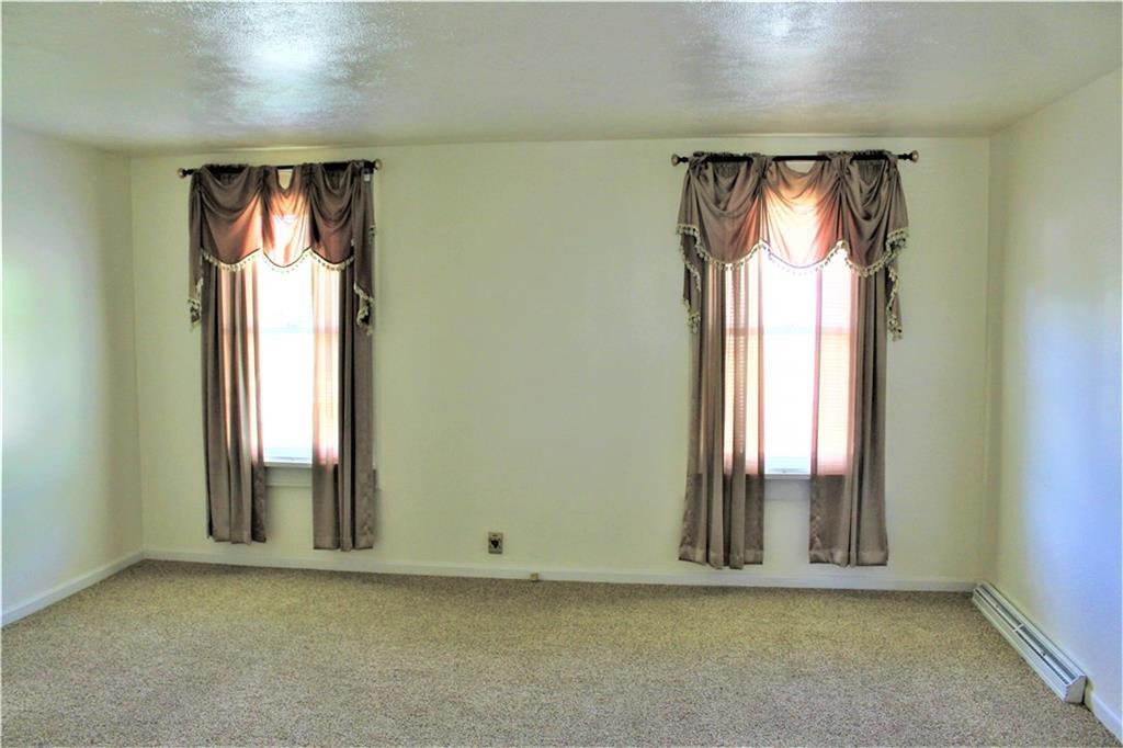 246 Oneida Valley Road Butler, PA 16001 - Photo 6 of 14 Living room with newer carpet