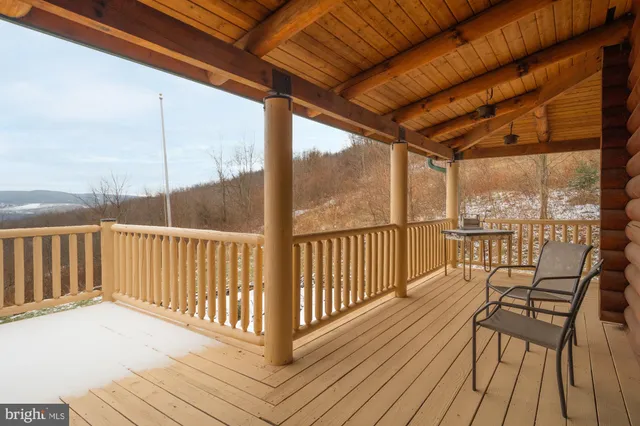 a view of a living room and balcony