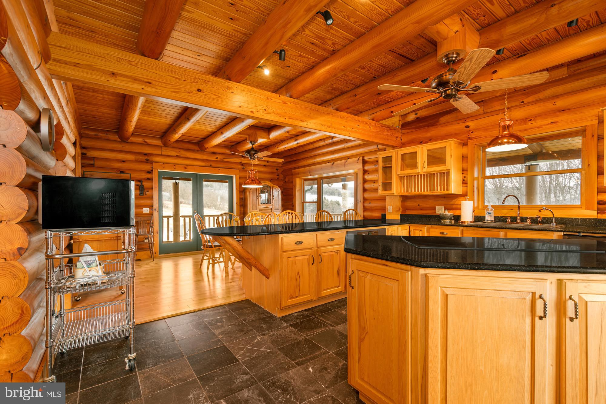 17051 Laurel Run Road Southwest Barton, MD 21521 - Photo 27 of 74 a view of a living room with a flat screen tv