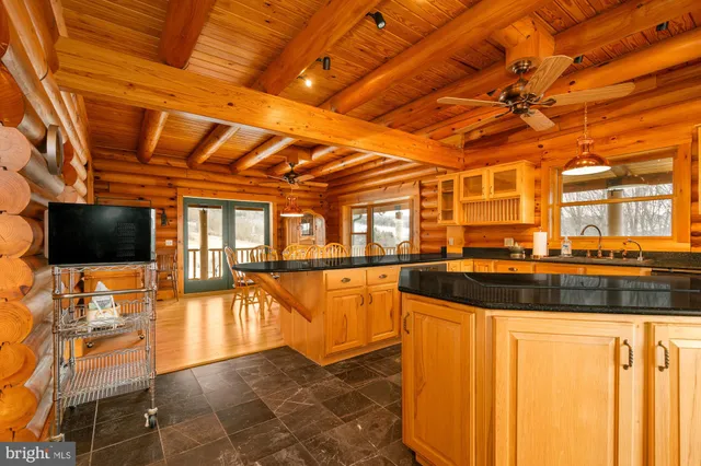 a large room with wooden floor and sliding door
