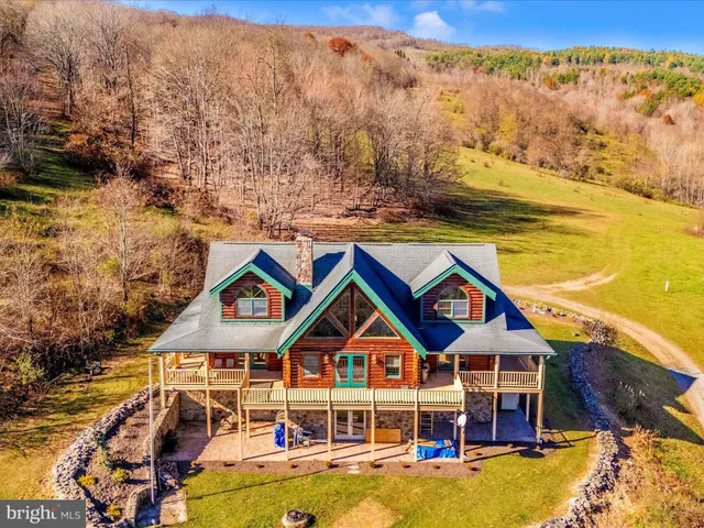 a view of a swimming pool with an ocean view