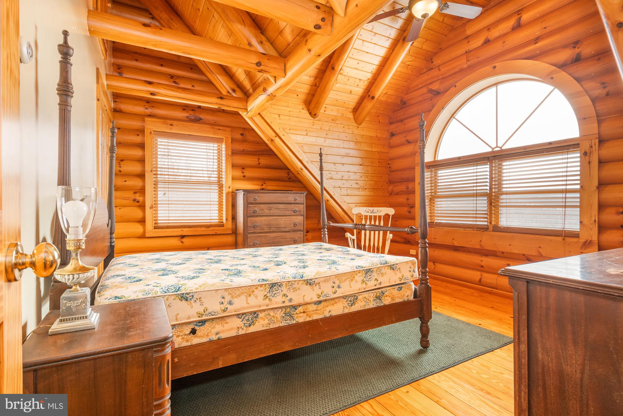 17051 Laurel Run Road Southwest Barton, MD 21521 - Photo 55 of 74 a bedroom with a bed and a window