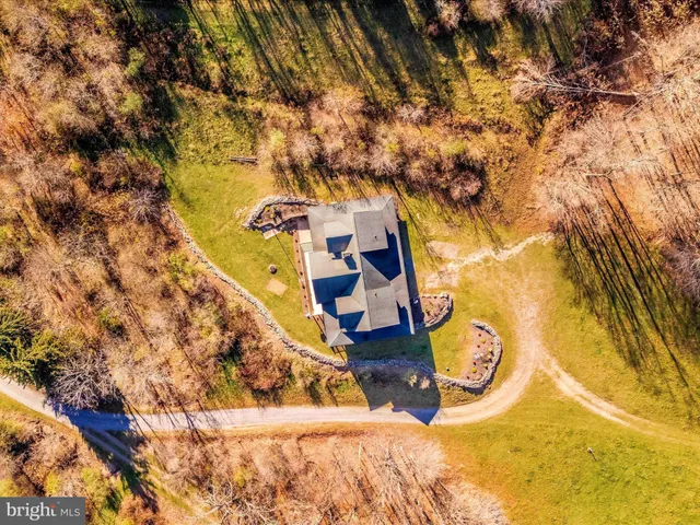 a view of a balcony with wooden floor