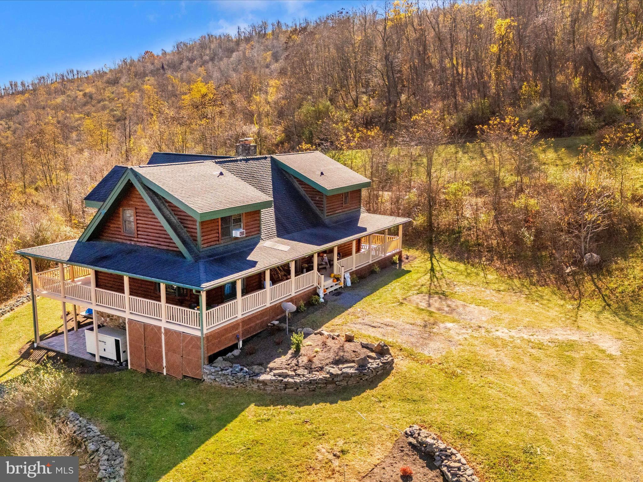 17051 Laurel Run Road Southwest Barton, MD 21521 - Photo 8 of 74 a view of a house with a big yard and large trees