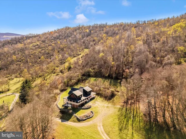 a view of balcony with wooden floor
