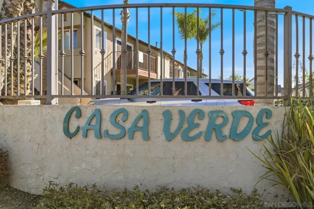 a view of a table and chairs in the garden