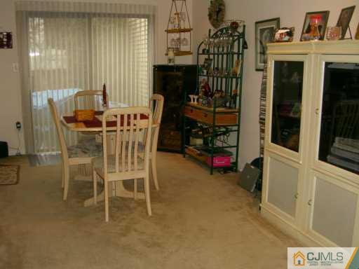 704 Timber Oaks Road Edison, NJ 08820 - Photo 3 of 8 a view of a dinning room with furniture