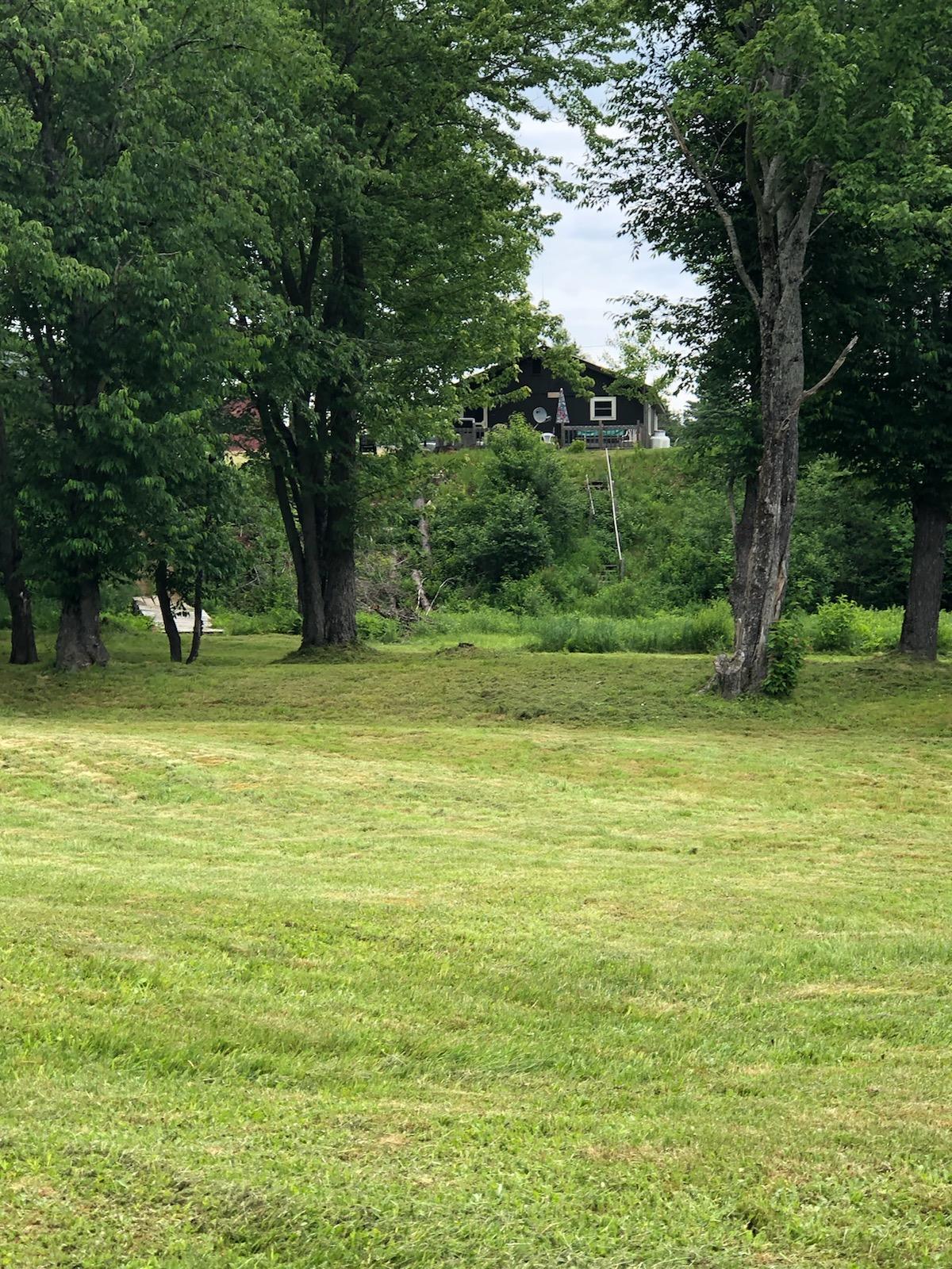 7 River Road Oquossoc, ME 04964 - Photo 11 of 13 looking from river