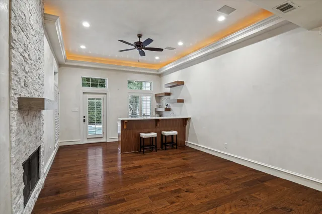 a view of a livingroom with furniture and wooden floor