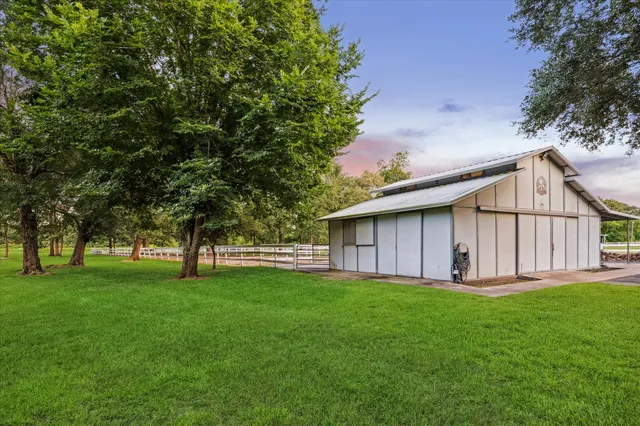 a view of a back yard of the house