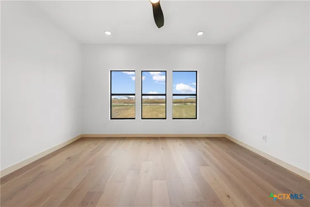 a bathroom with a double vanity sink and mirror