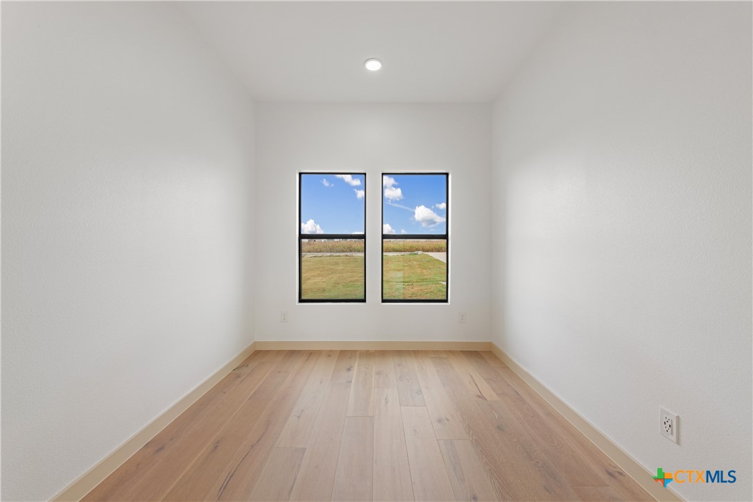 15121 Armstrong Ests Road Salado, TX 76571 - Photo 22 of 45 an empty room with a window