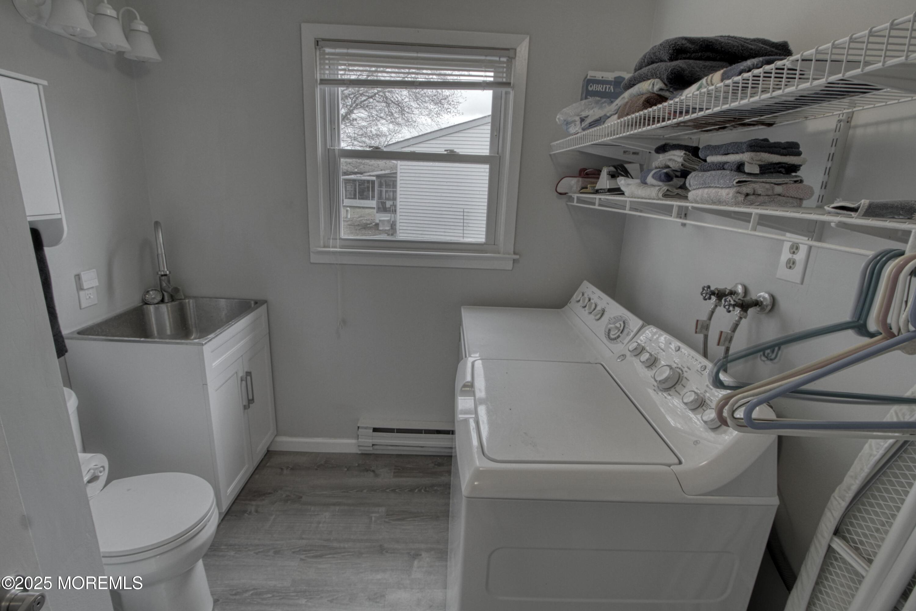 32 Augusta Road Whiting, NJ 08759 - Photo 17 of 30 a bathroom with a toilet sink and tub