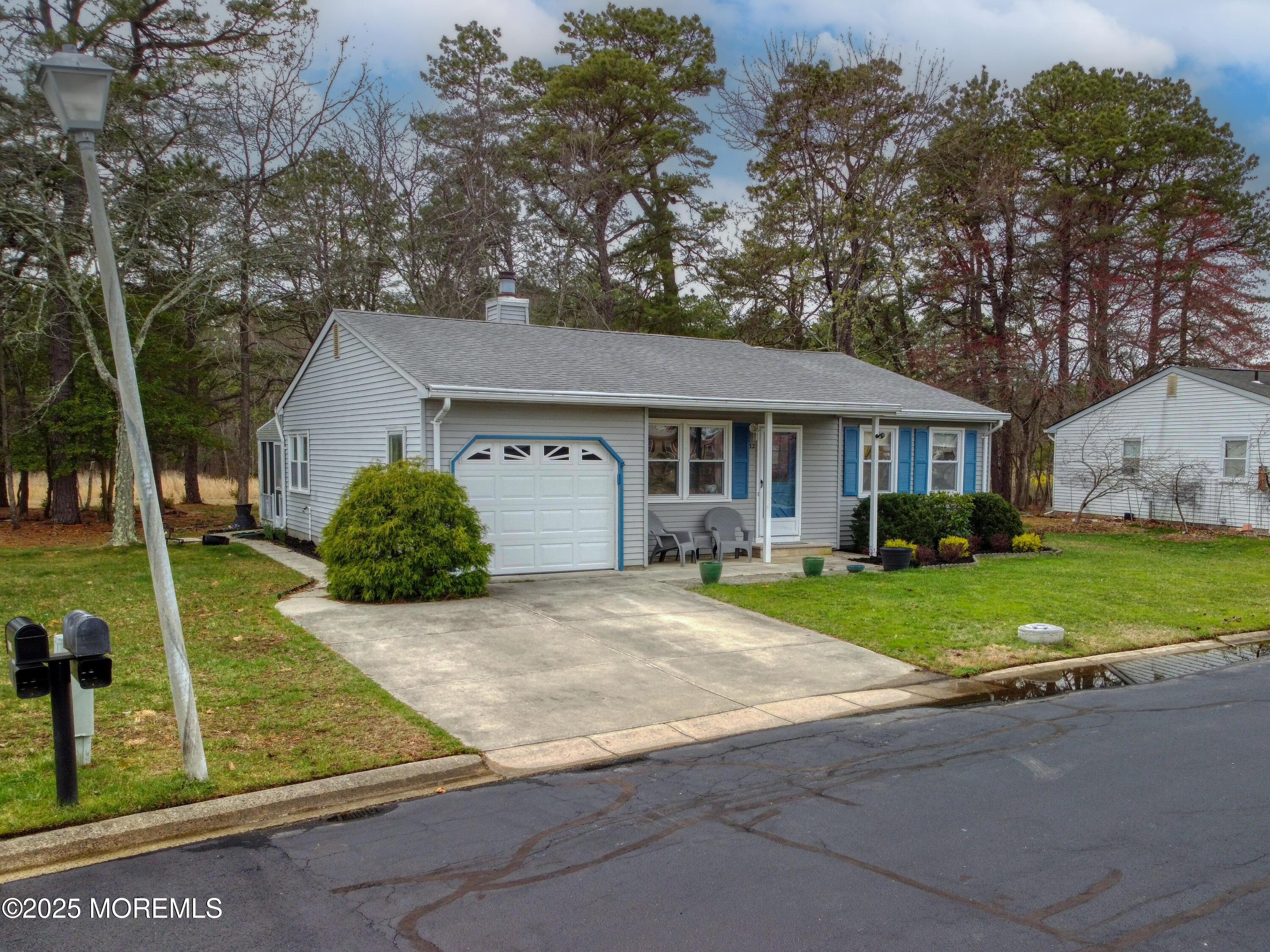 32 Augusta Road Whiting, NJ 08759 - Photo 24 of 30 a front view of a house with a yard