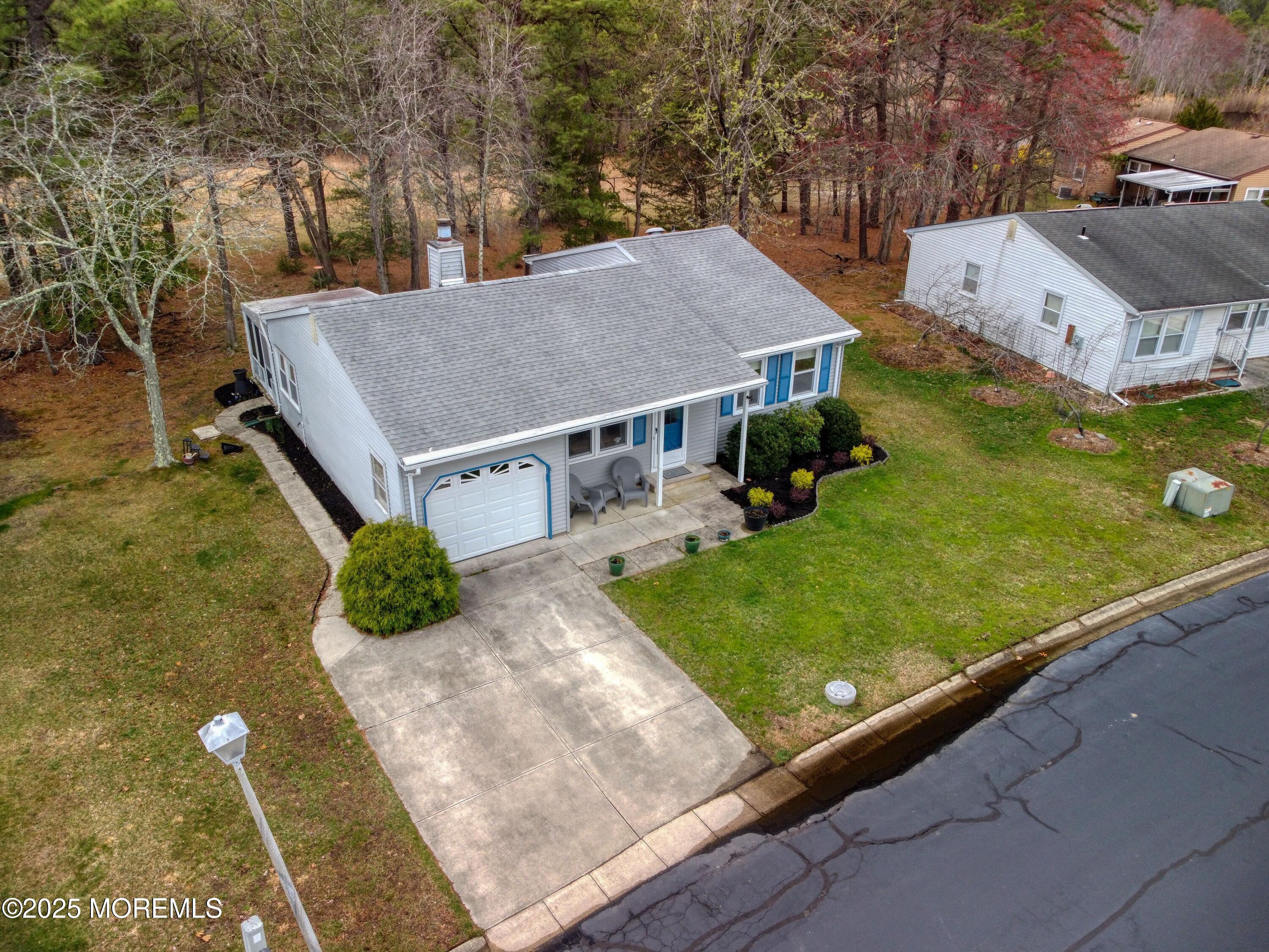 32 Augusta Road Whiting, NJ 08759 - Photo 26 of 30 a view of a house with yard and sitting area