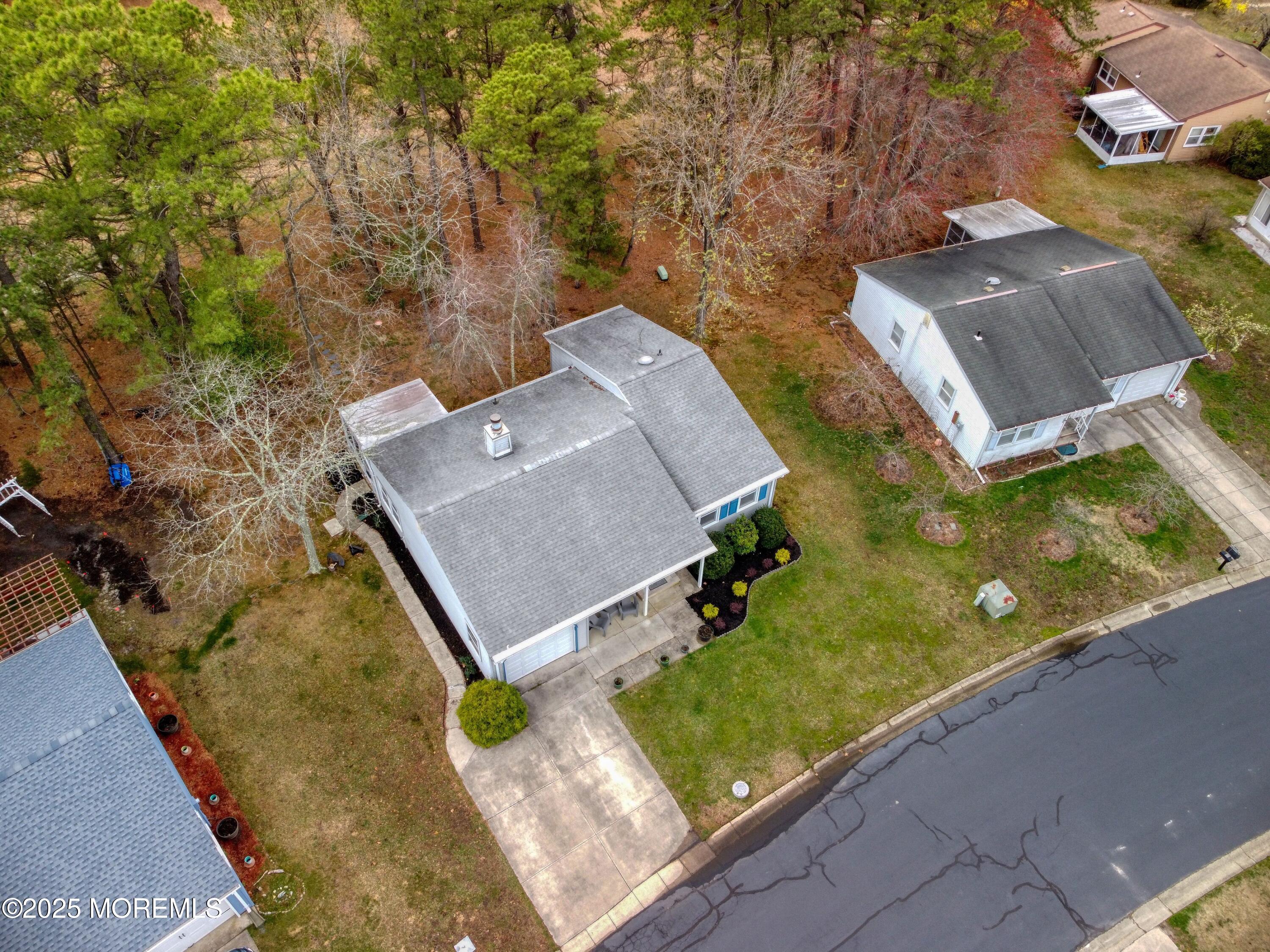 32 Augusta Road Whiting, NJ 08759 - Photo 27 of 30 an aerial view of a house with a yard
