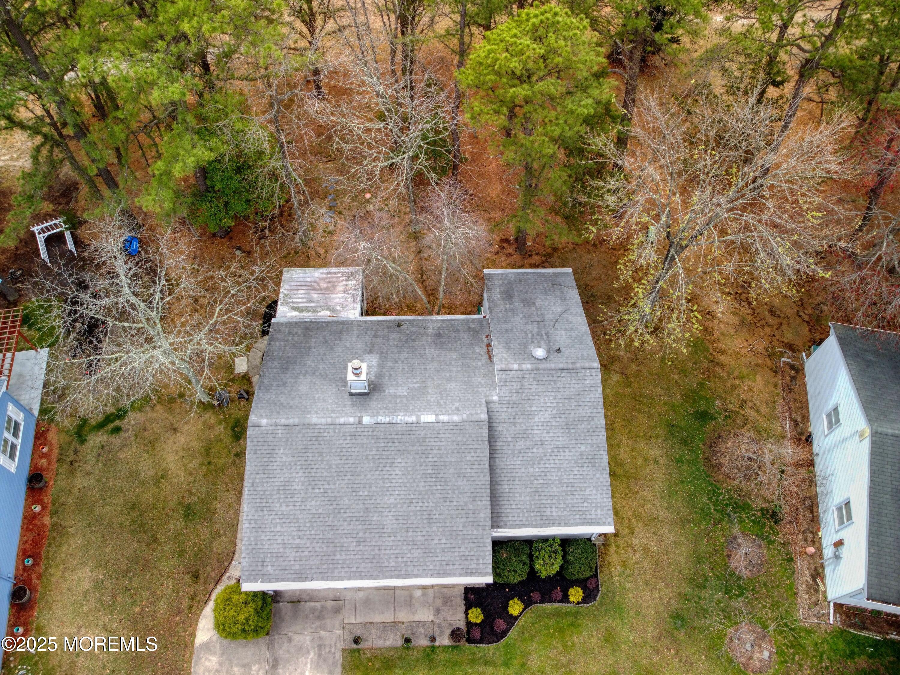 32 Augusta Road Whiting, NJ 08759 - Photo 28 of 30 an aerial view of a house with a yard