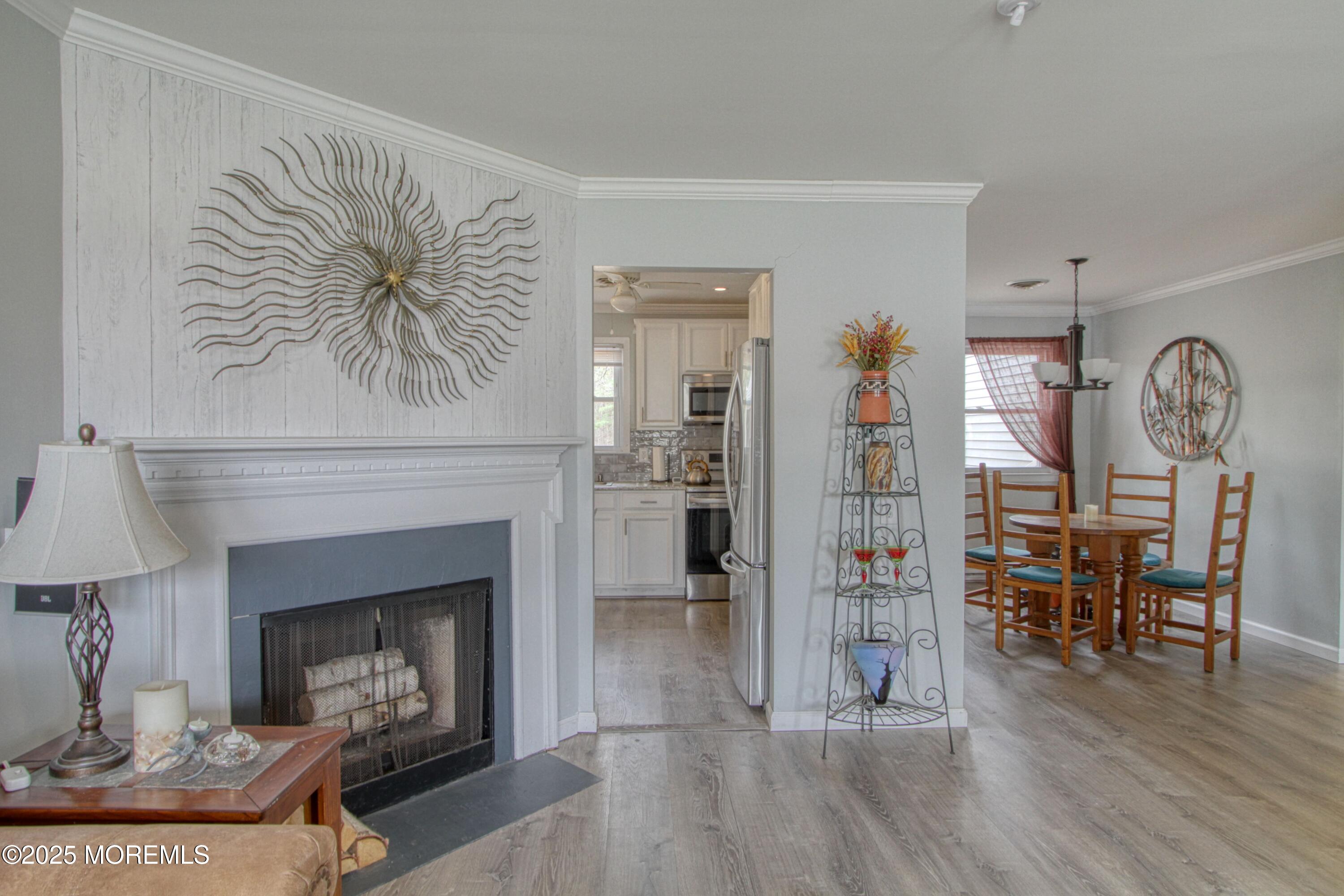 32 Augusta Road Whiting, NJ 08759 - Photo 5 of 30 a living room with furniture and a fireplace