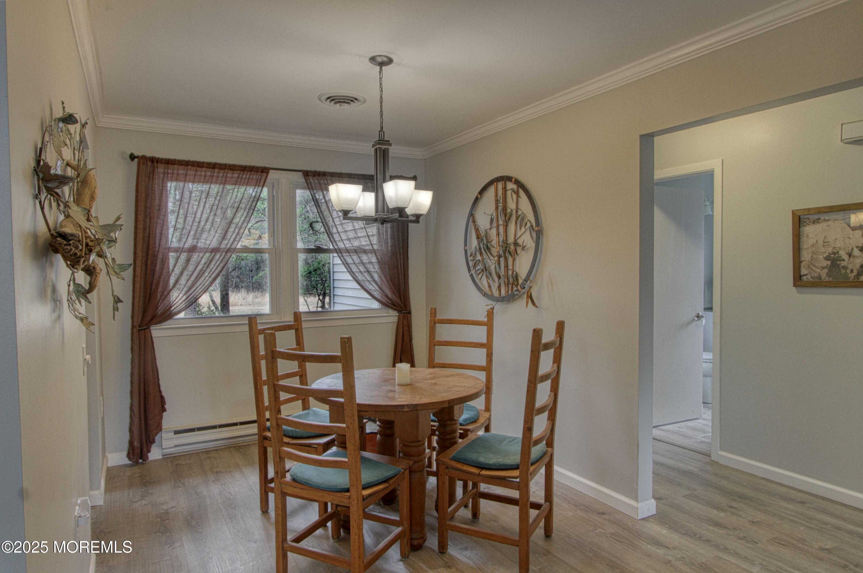 32 Augusta Road Whiting, NJ 08759 - Photo 6 of 30 a view of a dining room with furniture window and wooden floor
