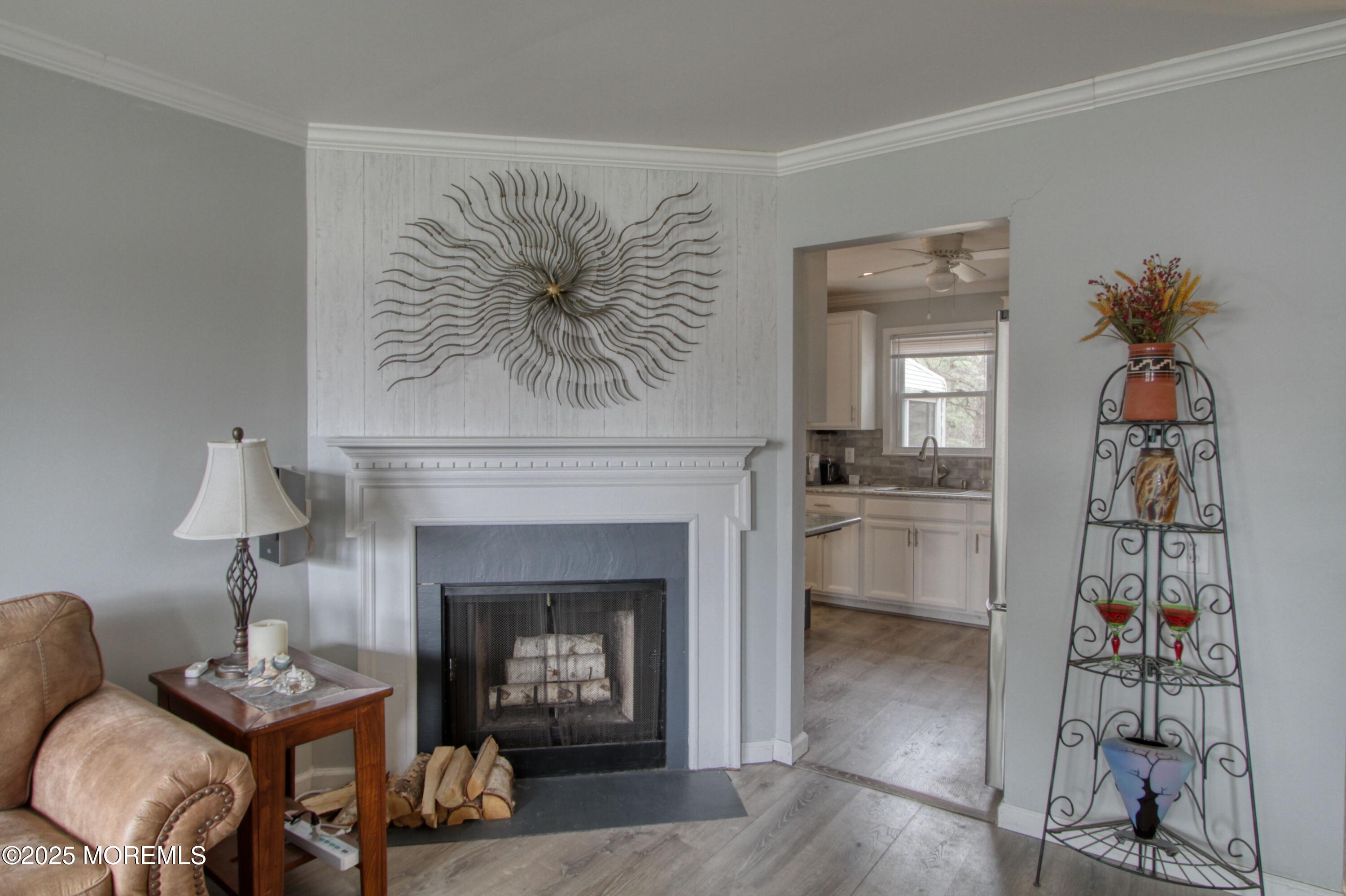 32 Augusta Road Whiting, NJ 08759 - Photo 9 of 30 a living room with furniture and a fireplace