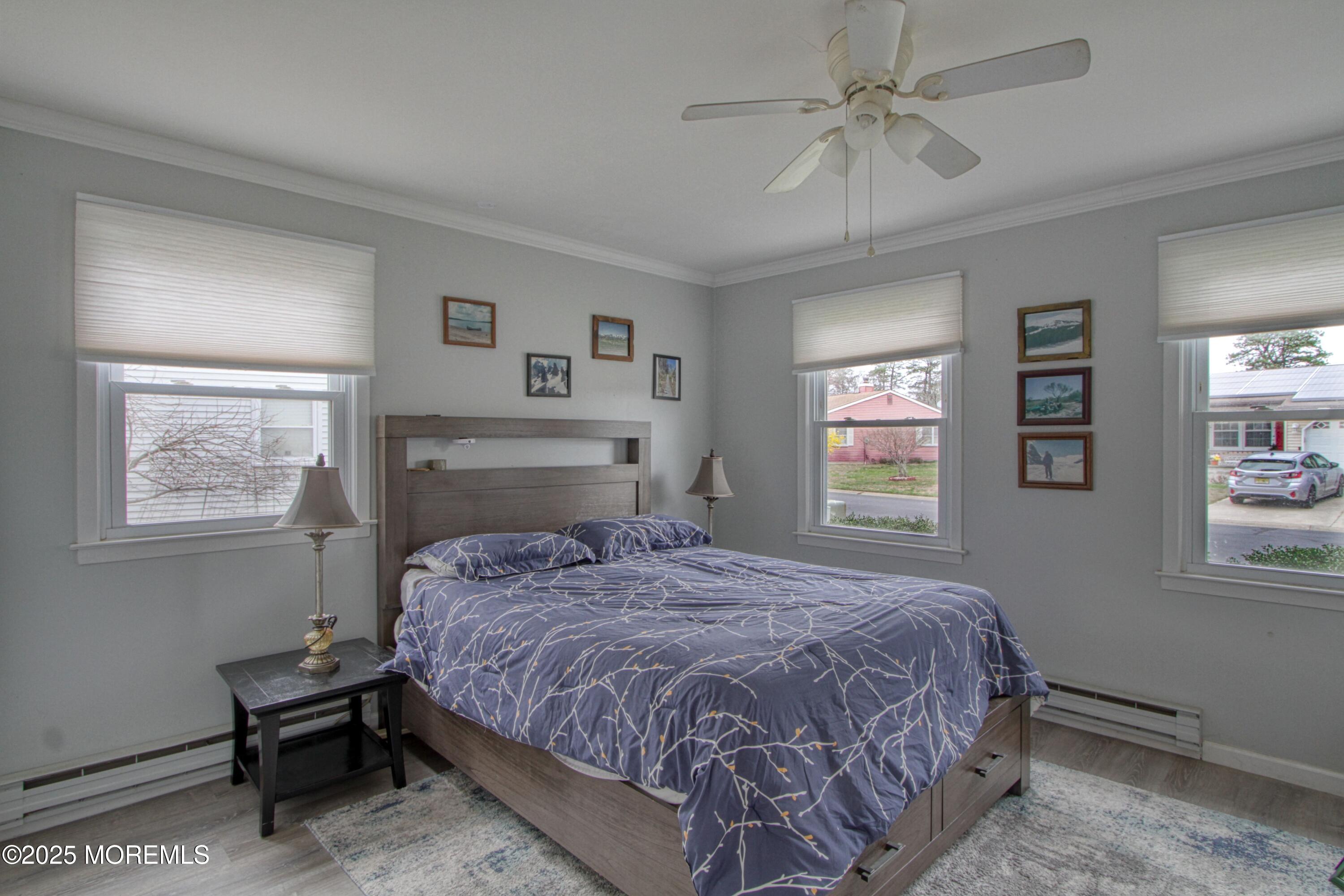 32 Augusta Road Whiting, NJ 08759 - Photo 10 of 30 a bedroom with a bed and a window