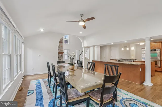 a kitchen with stainless steel appliances granite countertop a stove and a refrigerator