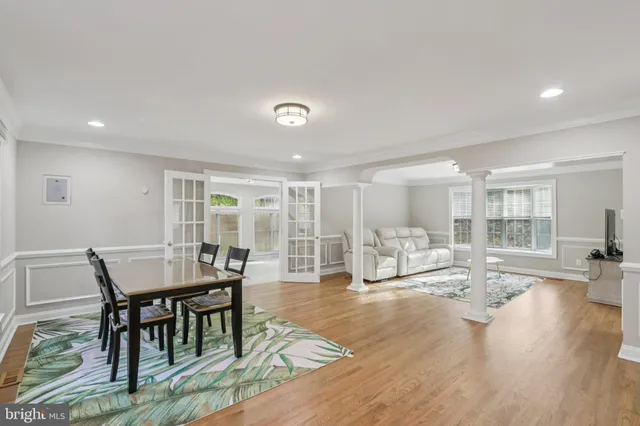 a kitchen with stainless steel appliances granite countertop a stove and a refrigerator