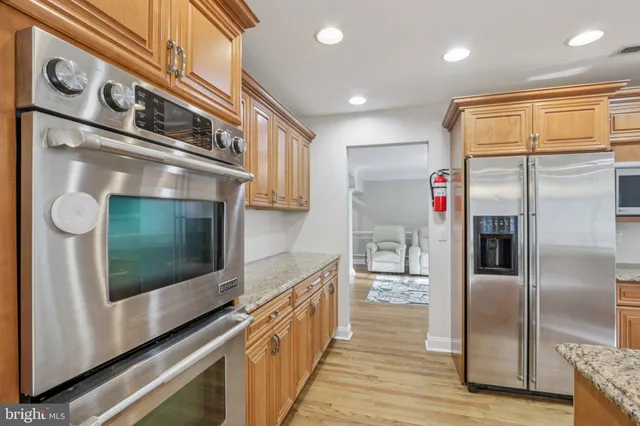 a bed room with a bed and a desk