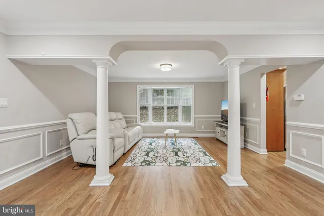 a spacious bathroom with a sink a mirror and a shower