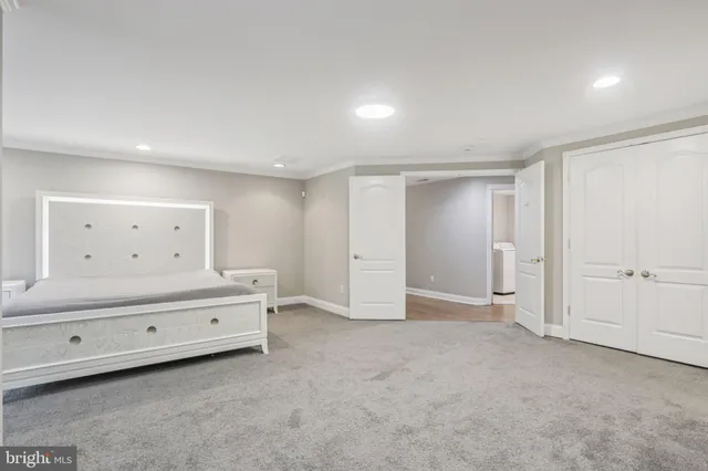 a white toilet sitting next to a bathroom sink