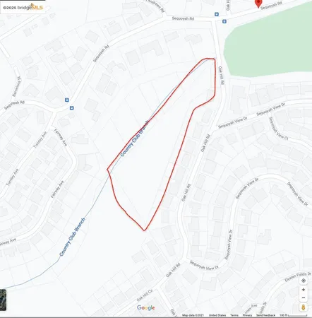 a picture of a bathroom with a shower